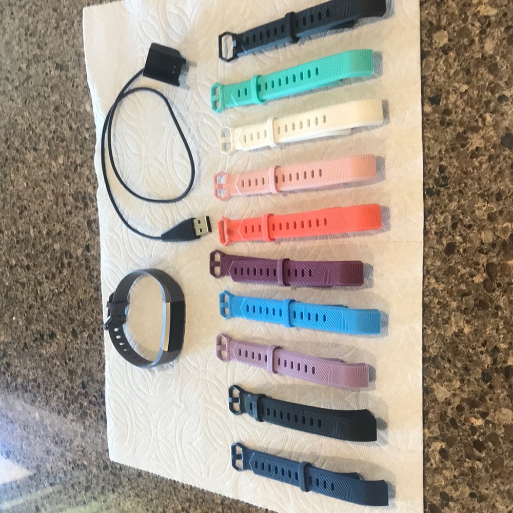 fitbit HR tracker with 11 bands.